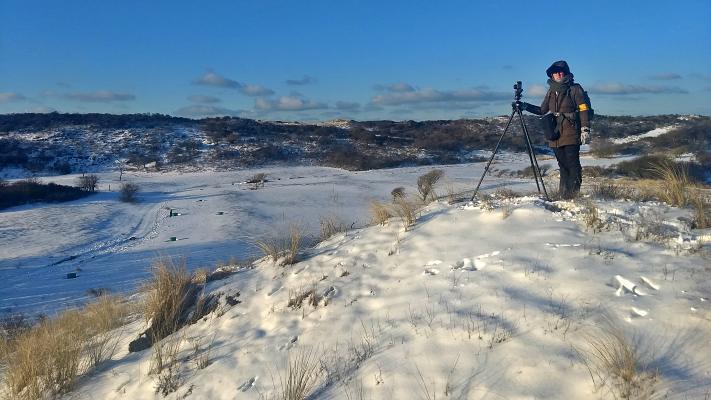 Ana Luisa Santos filming wildlife in the snow